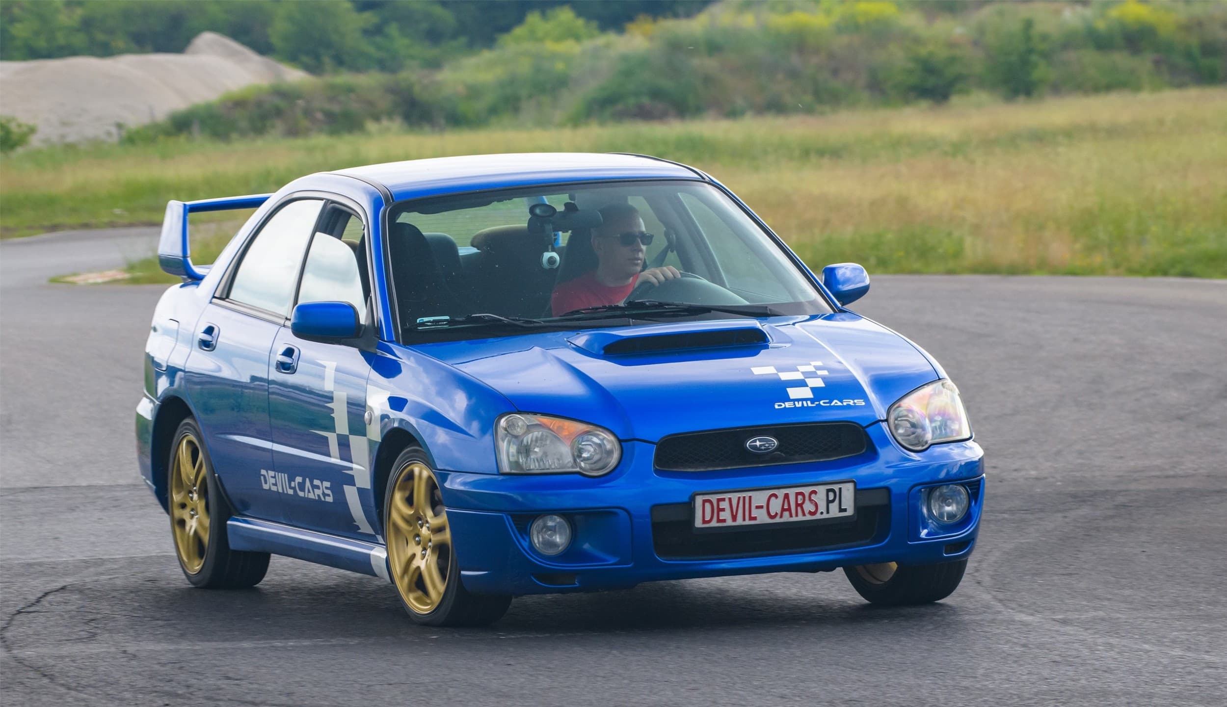 Pojedynek Subaru Impreza WRX vs. Porsche 911 | 2 okrążenia | Tor Główny